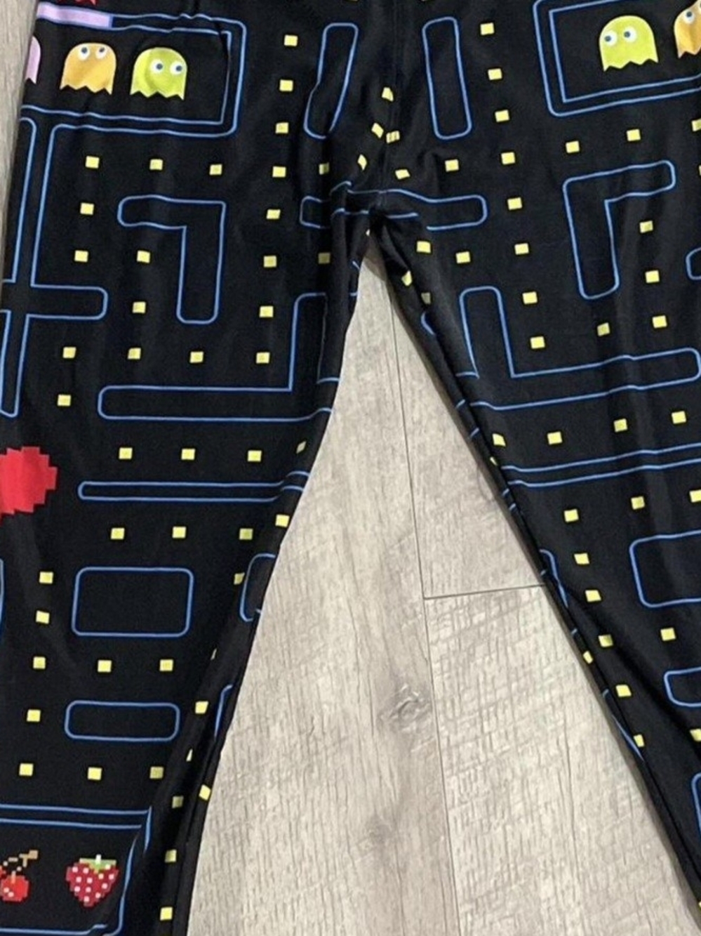 & Other Stories Black Pac-Man Inspired Leggings with Colorful Pixel Motifs